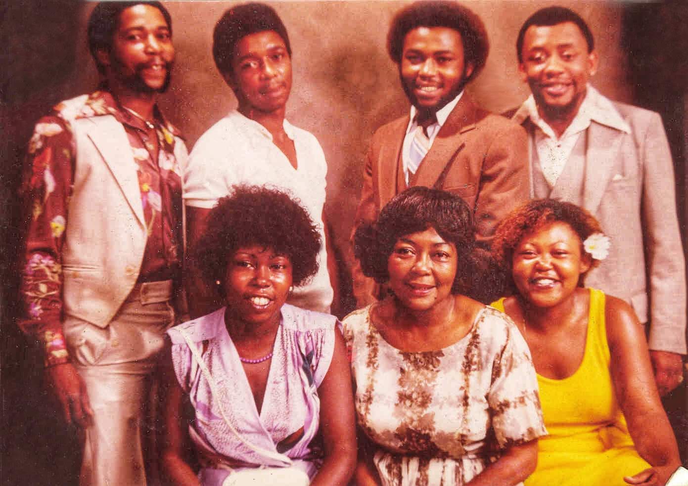 Jerry's brothers and 2 sisters. Jerry's second from left on top, his mother, Ernestine is center in the first row.