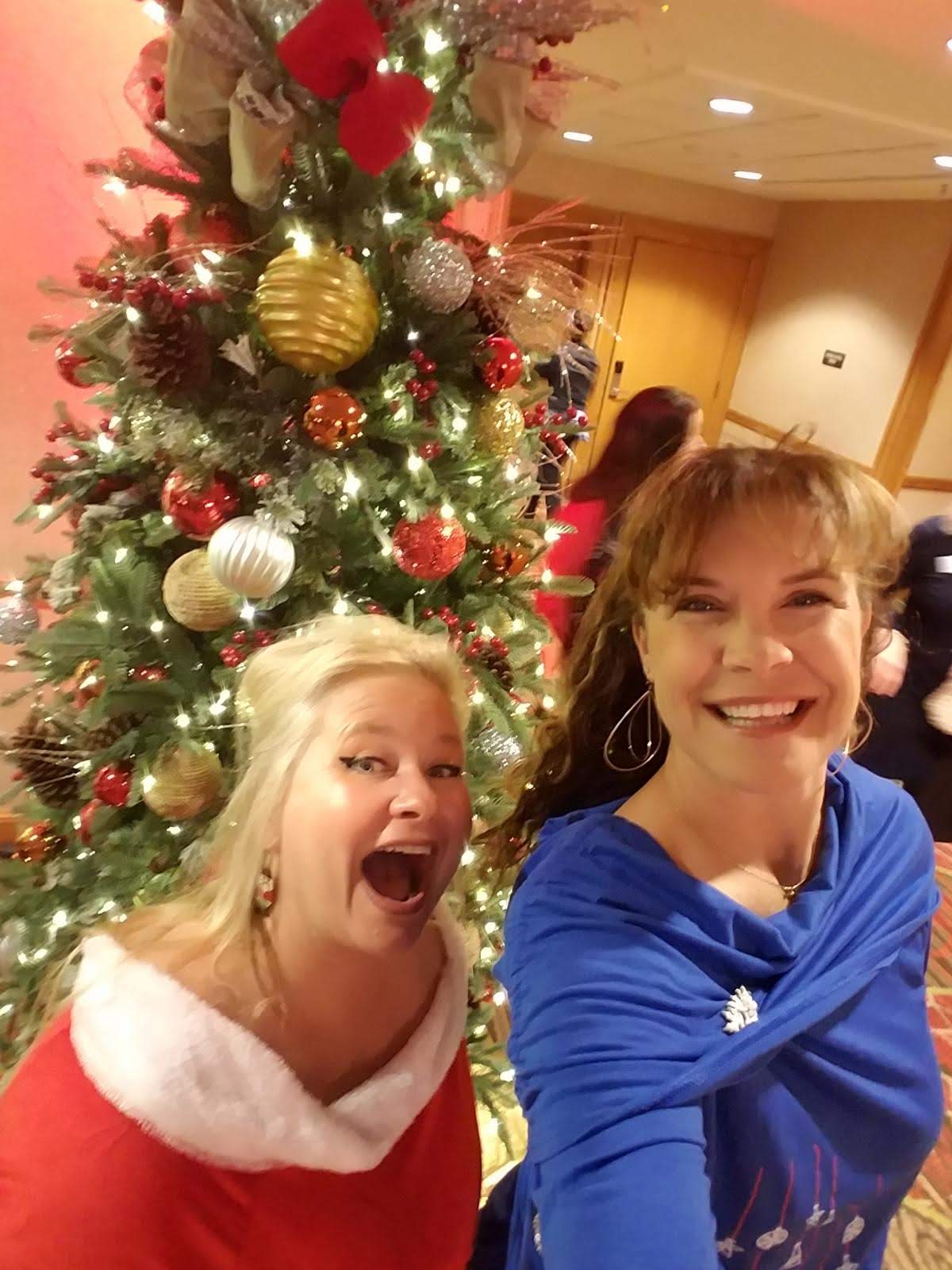 Tracy and Christy at a business holiday party